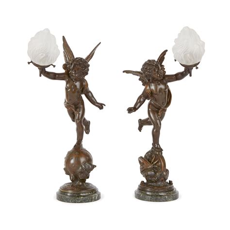 Pair of French antique bronze table lamps with cherubs | Mayfair Gallery