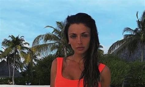 Kady Mcdermott Poses In A Neon Orange Swimsuit And A Black Bikini In The Maldives With Myles
