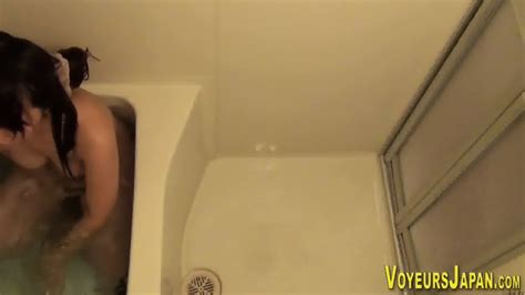 Asian Teen Washes Pussy
