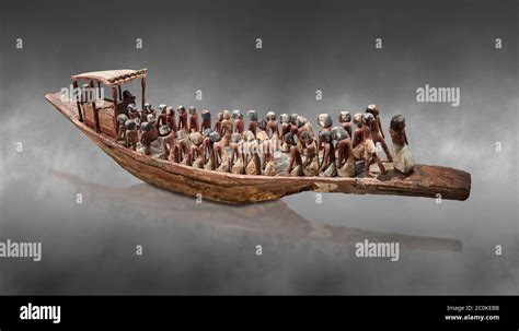 Ancient Egyptian Model Of A Funerary Boat With Oarsman And A Sarcopagus