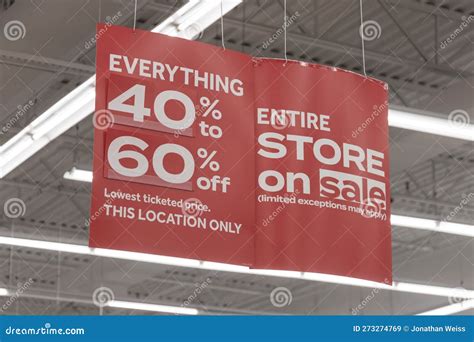 Store Clearance And Discount Signs Displayed At A Soon To Be Out Of