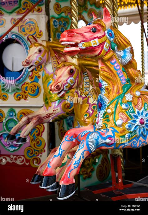 Traditional Carousel Horse Rides At A Funfair Stock Photo Alamy