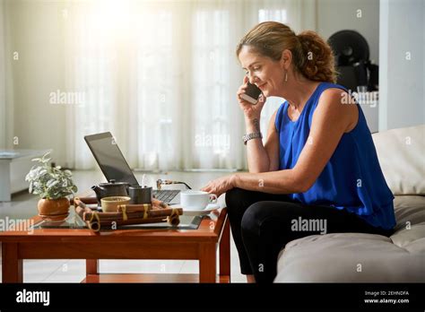 Mature Woman Making Phone Call Stock Photo Alamy