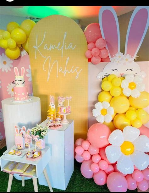 An Easter Themed Party With Balloons And Decorations