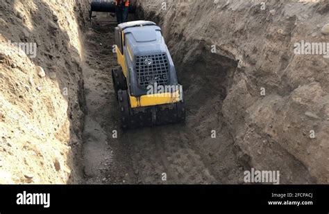 Trench compactor Stock Videos & Footage - HD and 4K Video Clips - Alamy