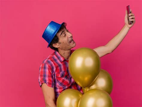 Homme De Parti Caucasien D âge Moyen Impressionné Portant Un Chapeau De