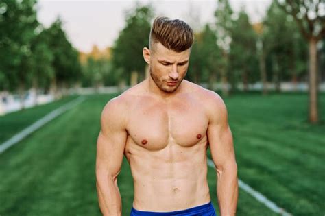 Premium Photo Portrait Of Shirtless Man Standing Outdoors