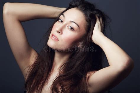 Mysterious Beauty Portrait Of A Beautiful Brunette Posing For The Camera Stock Image Image