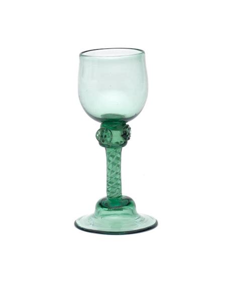 Bonhams A Rare English Green Tinted Opaque Twist Wine Glass Circa 1760 70