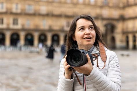 Traveler Woman Photographing Plaza Mayor Of Salamanca With Professional