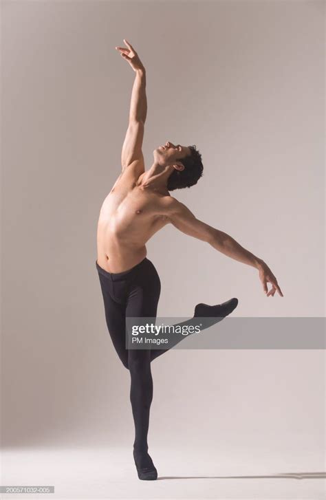 Man practising ballet pose, looking up | Ballet poses, Human poses ...