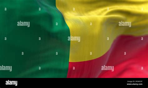 Close Up View Of The Benin National Flag Waving In The Wind Stock Photo