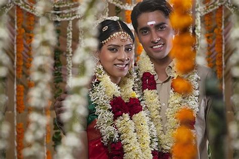 Indian Wedding Couple Standing Wearing Sherwani And Lehenga Wedding Couple Outfits Fashion