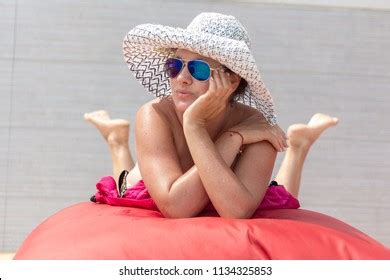 Woman Naked White Hat Sunglasses Lies Stock Photo Shutterstock
