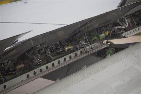 Detail of the Wing of an Airplane with Flaps in Motion Stock Photo - Image of aerodrome, taxiing ...