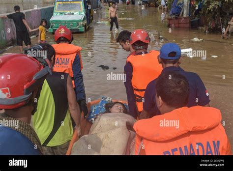 A Rescue Team Evacuate Flood Victims In Kampung Melayu East Jakarta