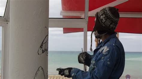 Artist Painting the Mural Outdoors, Stock Footage | VideoHive