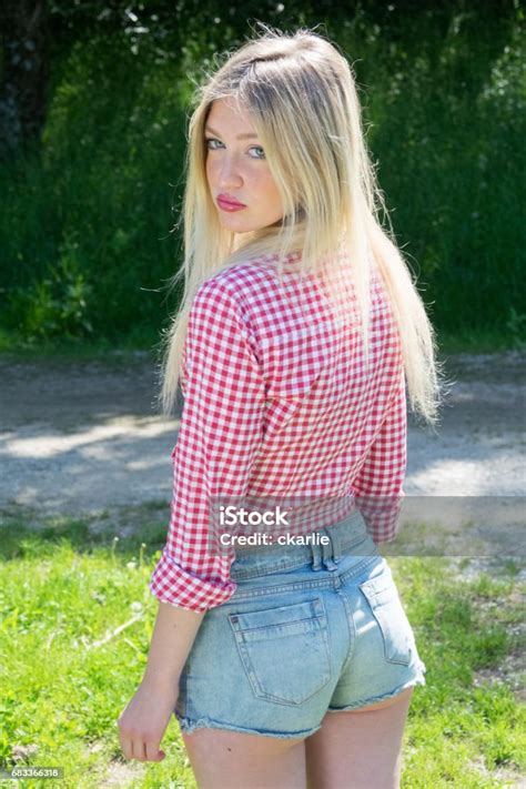 Young Blonde Woman In Park Cute Teenage Girl Outdoors Mild Retouch