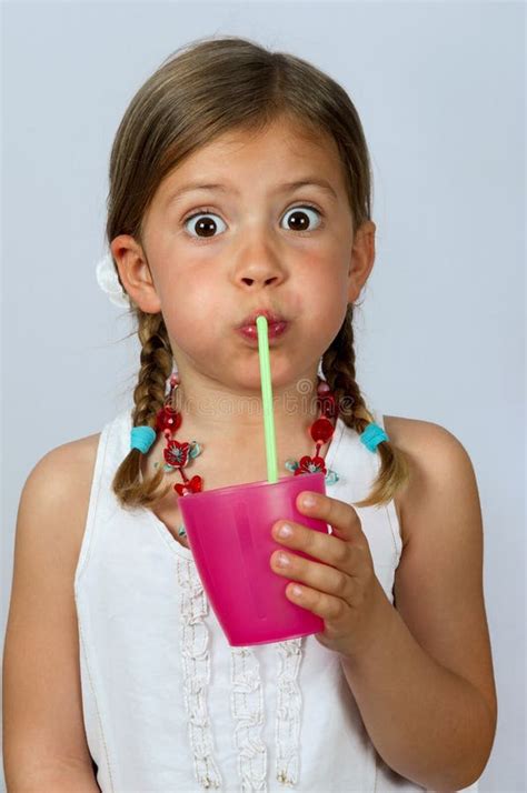 Girl Drinking Through A Straw Stock Photo Image Of Cute Straw 14047818