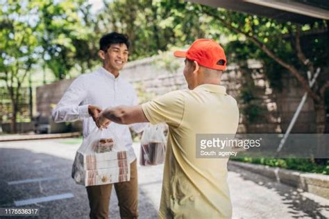 Delivery In Front Of Door Photos And Premium High Res Pictures Getty