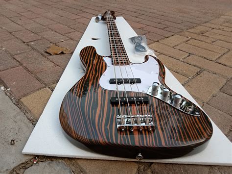 Strings Electric Bass Guitar Zebra Wood Body Neck Bj