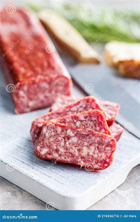 Smoked Sausage Sliced Salami On Cutting Board Stock Photo Image Of