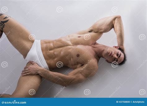 Sexy Naked Muscular Man With Sixpack Abs Lying In Bed Handsome