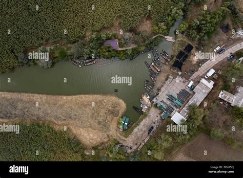 Aerial View Of Fishermen Pier Dock With Many Fishing Boats Parked In A