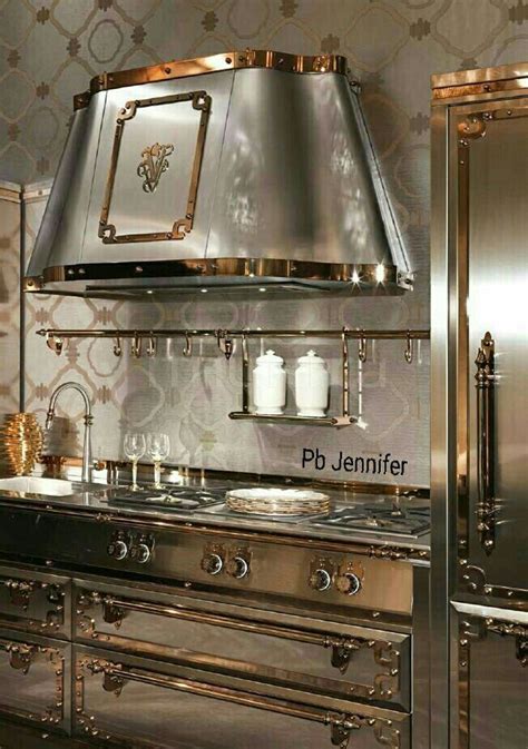 A Stove Top Oven Sitting Inside Of A Kitchen