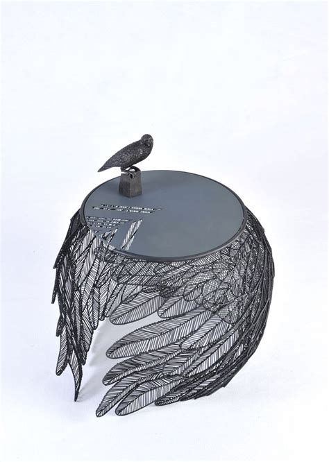 Apiwat Chitapanya Welds Stainless Steel Feathers To Create Table