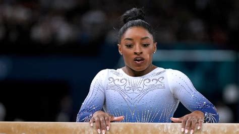 Simone Biles falls off balance beam | 11alive.com