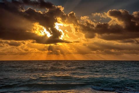 Premium Photo Sunset On The Caribbean Sea Clear Sky With Small Clouds