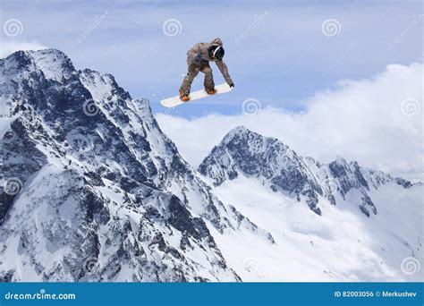 Snowboard Rider Jumping On Mountains Extreme Freeride Sport Stock