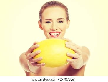 Portrait Nude Woman Holding Yellow Mango Stock Photo