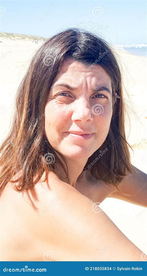 Beach Summer Beach Portrait Of Middle Aged Beautiful Year Old Brunette Woman Stock Photo