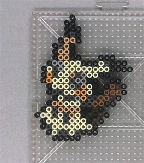 An Image Of A Piece Of Art Made Out Of Beads