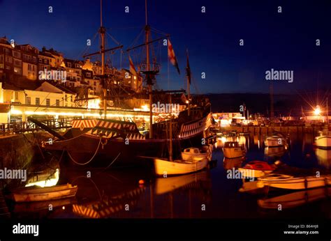 Brixham harbour at night Stock Photo - Alamy