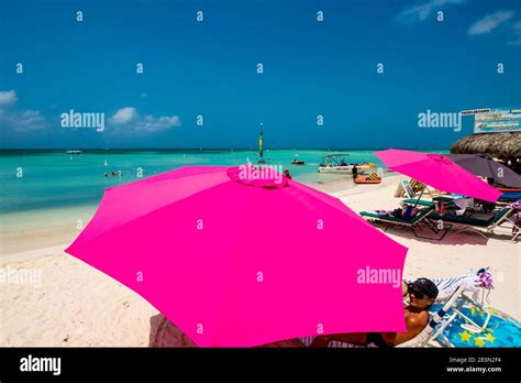 Umbrellas on Hadicurari Beach, Aruba Stock Photo - Alamy