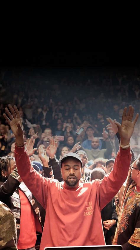 Download American Musician Kanye West Performing On Stage At One Of