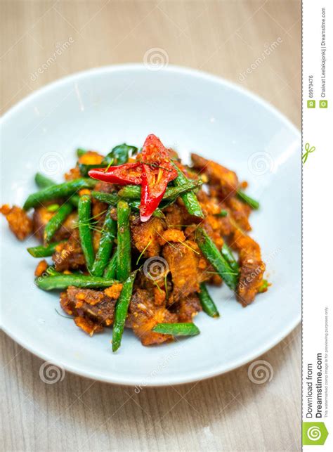 Thai Stir Fried Pork With Curry Paste Stock Photo Image Of Green