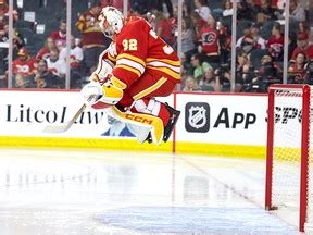 Flames sign goalie Dustin Wolf to ﻿two-year deal | Calgary Herald