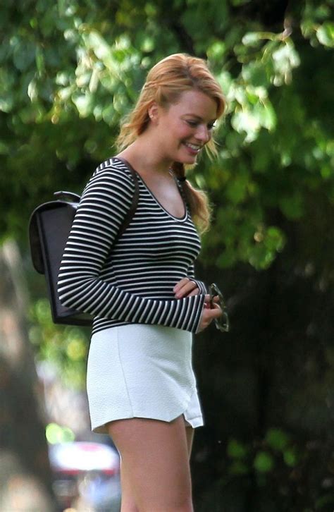 Margot Robbie Booty in Shorts at a Park in London - Sept. 2014 • CelebMafia