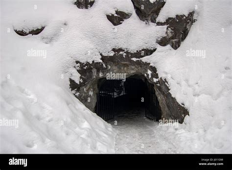 Cave in the snow outdoors Stock Photo - Alamy