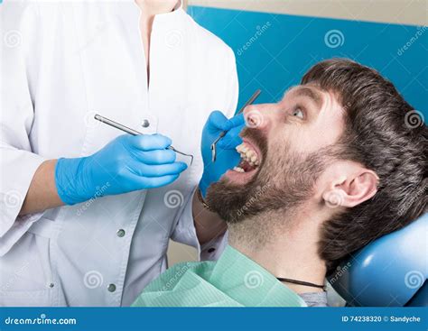 Doctor Examines the Oral Cavity on Tooth Decay. Caries Protection ...