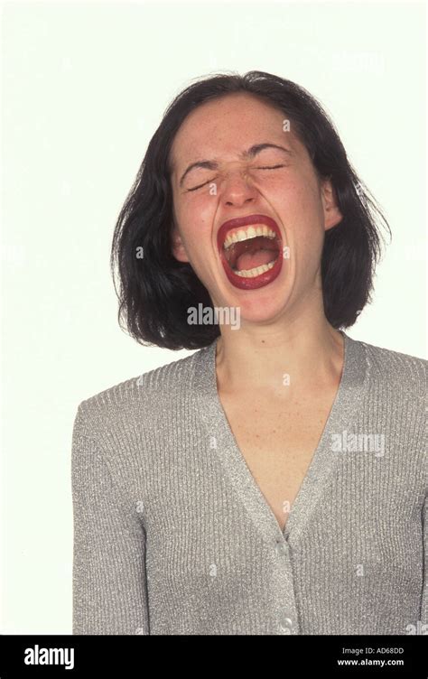 Woman in pain screaming Stock Photo - Alamy