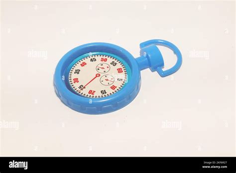 Blue toy stopwatch on a white background Stock Photo - Alamy