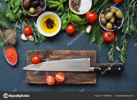 Italian food ingredients background with herbs and olive — Stock Photo © malyuginphoto #140246404