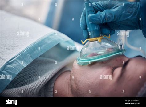 Anesthesia Oxygen Mask And Medical With Man In Surgery For Breathing