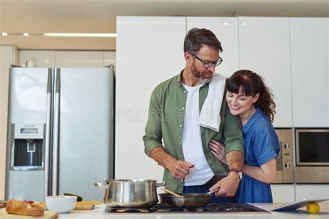 I Cant Wait To Dig In To That A Mature Couple Cooking Together At Home Stock Image Image Of