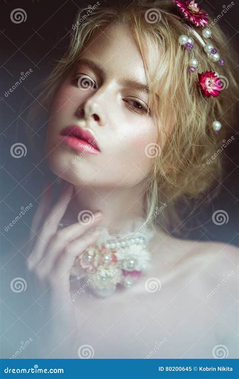 Beautiful Blond Fashion Girl With Flowers On Neck And In Her Hair Wet Nude Makeup Beauty Face